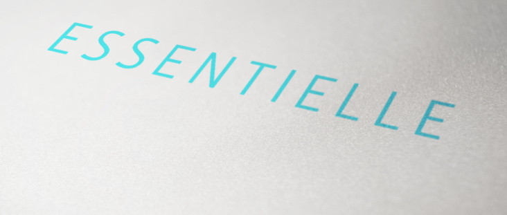 Diseño de logotipo de la línea ESSENTIELLE para la firma de cosmética internacional ATACHE s.a.