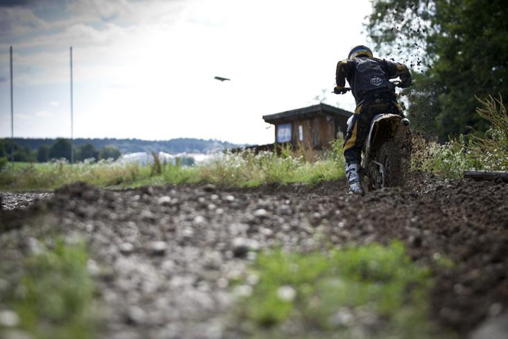 Motorcross rider practising in the Bavarian countryside.