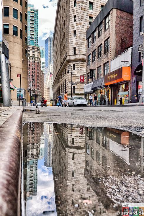 Skyscraper in a Puddle