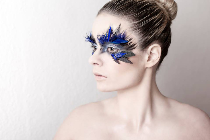 portrait blue feathers