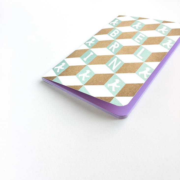 A5 notebook with colored pages