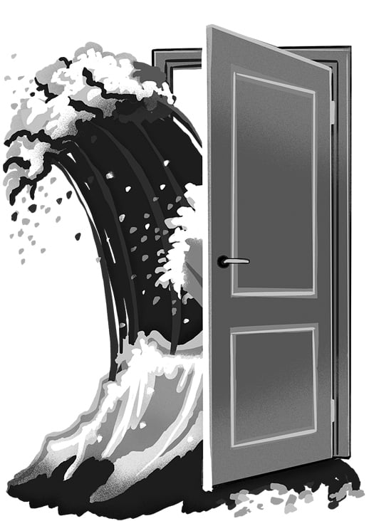 Eine Wasserwelle kommt durch die Tür