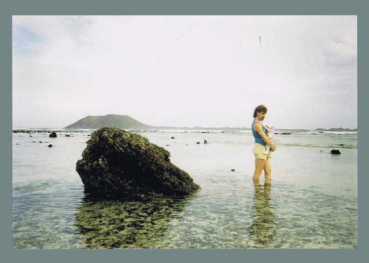 the artist as a baby time traveling with his father at the lagoon landscape of the Upper Jurassic 150 mio. years ago