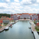 Visualisierung eines Hotelneubaus (im Hintergrund), Montage in Originalfoto des Bauplatzes