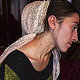 Nazira Barotovo, 25 years old.  Shows the traces of violence on her neck. After getting divorced, the court gave her and her tw