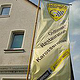 Flagge für eine Restaurationsfirma