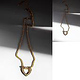Goldkette mit Herzanhänger | Dramatische Lichtretusche